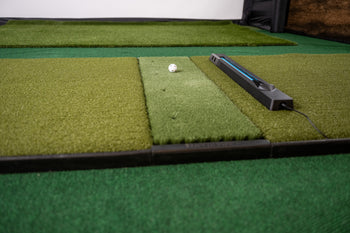 NOVA Golf Entertainment System full setup with hitting mat, golf ball, and projection screen